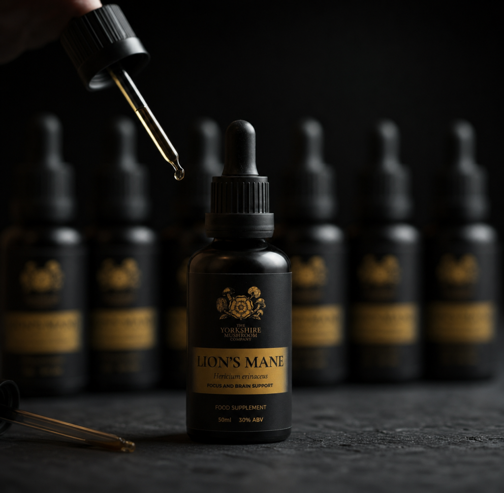 Matte black 50ml tincture dropper bottles during small batch bottling